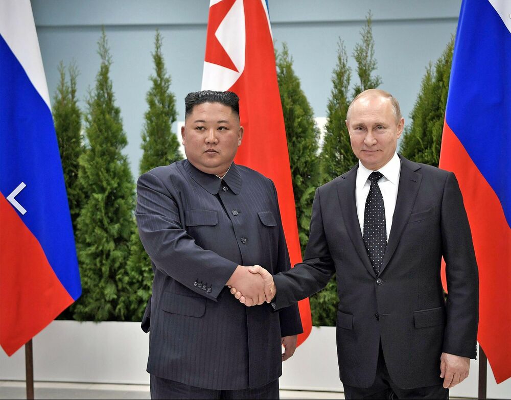 Vladimir Putin i Kim Džong Un 