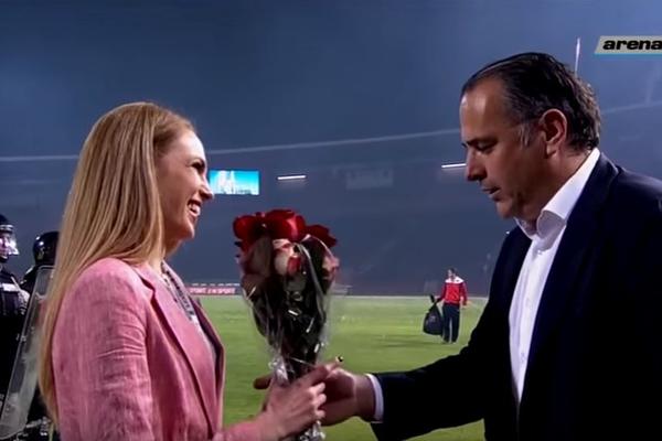 Grofovski za kraj: Prvo joj je držao kišobran, a sada je oborio s nogu lepu voditeljku! (VIDEO)