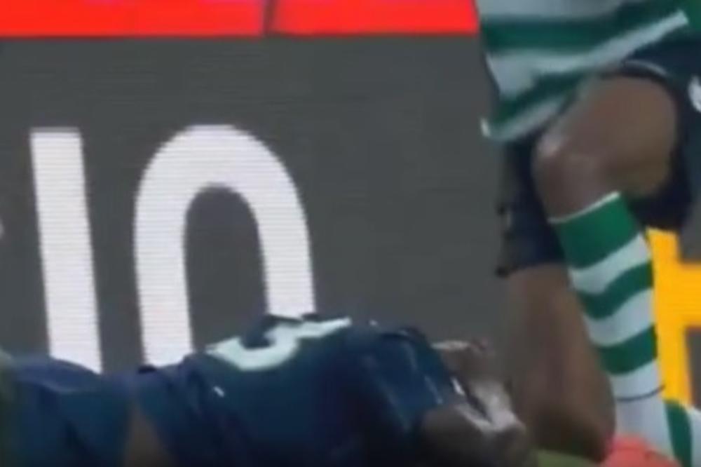 Teška povreda fudbalera Volfsburga, levi bek Sportinga mu slomio vrat! (VIDEO)
