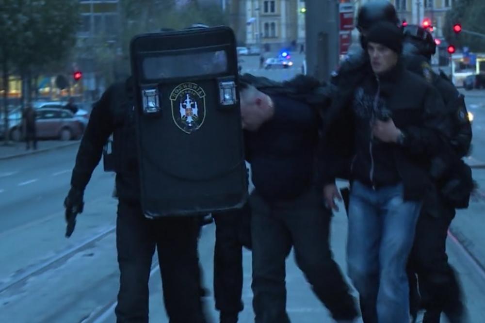 Pogledajte dramatično hapšenje muškarca koji je pretio bombama ispred Vlade Srbije! (VIDEO)