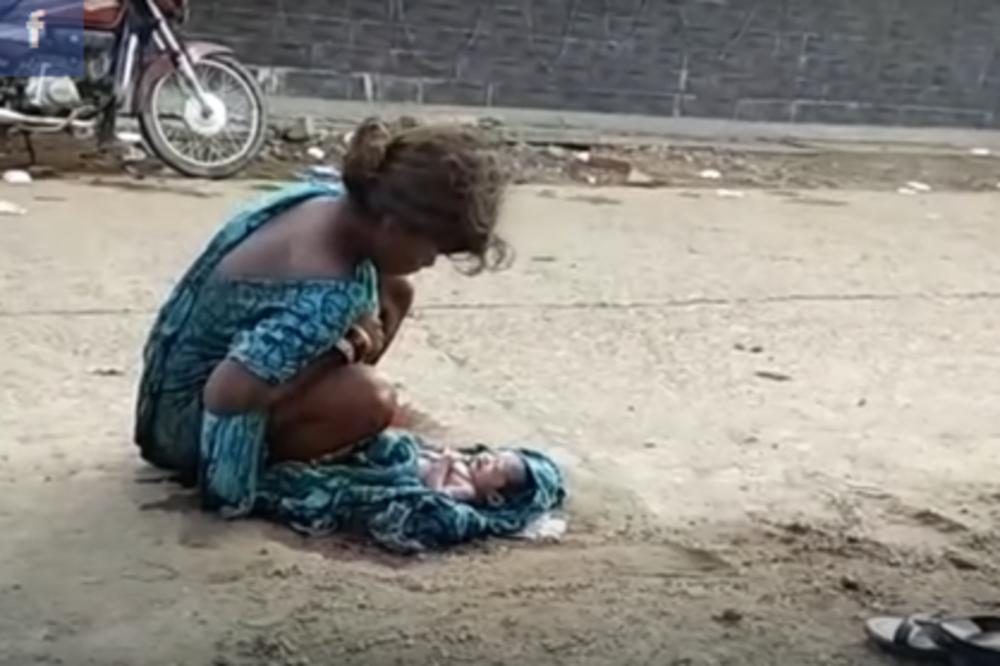 Porodica je izbacila jer je zatrudnela: Porodila se NA ULICI dok su je svi SNIMALI bebu koja leži na krvavoj haljini, a ona nije imala snage da se pomakne! (VIDEO)