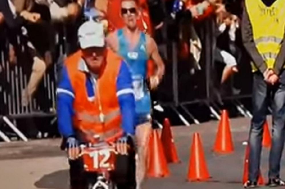 Maratoncu "alatka" landarala tokom trke, ali je od toga veći hit reakcija žene sudije kada je videla šta je u pitanju! (VIDEO)