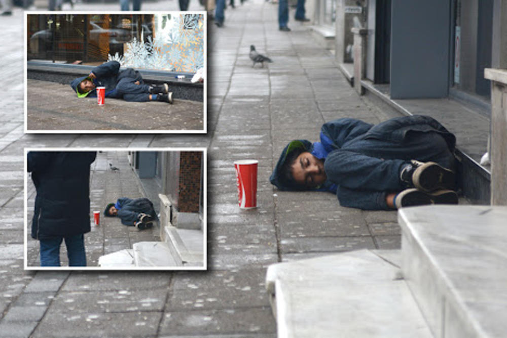 POTRESNA SCENA S BEOGRADSKOG TROTOARA: Dečak leži, spava na betonu, a kiša pada! NIKO DA MU POMOGNE! (FOTO)