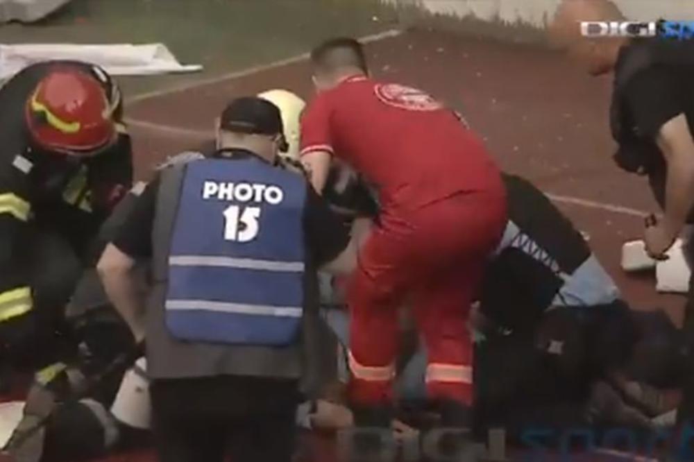 JEZIVO! POLICAJAC UDAREN KAMENOM U GLAVU: Nepomično ležao na atletskoj stazi dok su mu panično ukazivali pomoć!