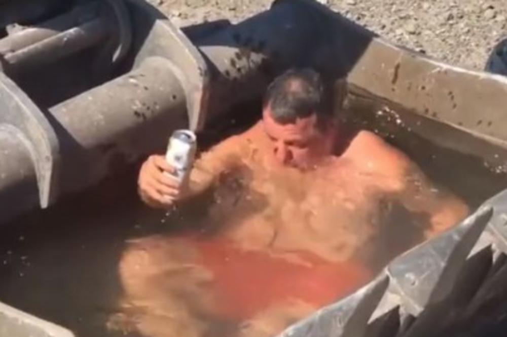 OKEJ, OVAJ BATICA JE OBJASNIO PRIČU! Našao je bazen na RADNOM MESTU, i ohladio se uz PIVCE! (VIDEO)
