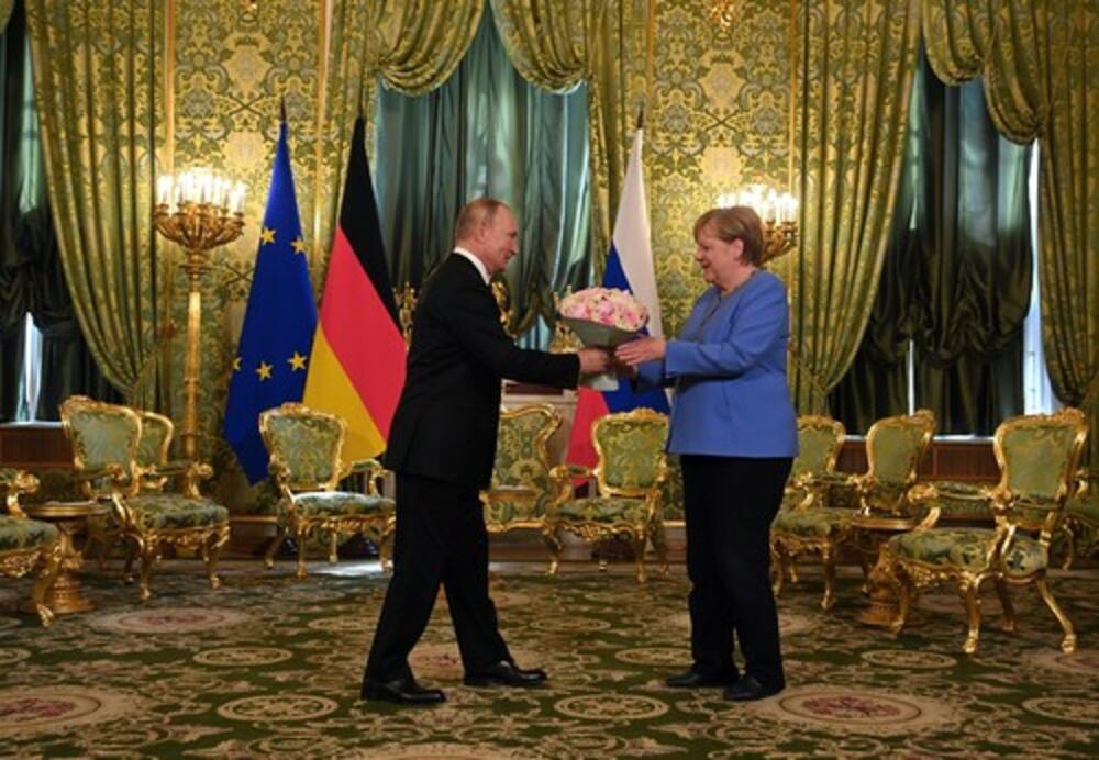 Putin i Angela Merkel