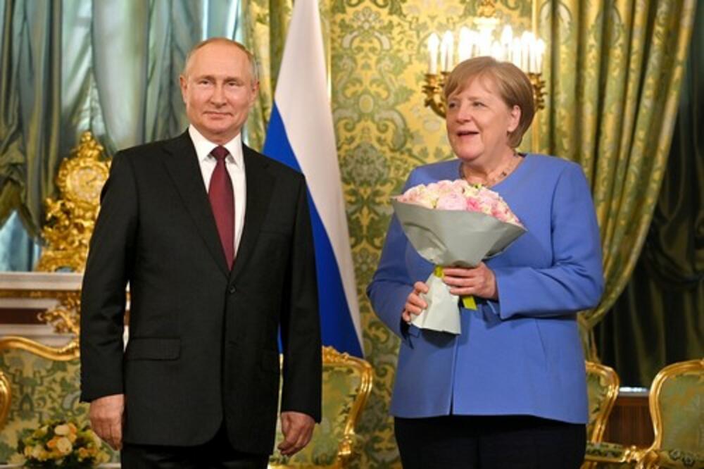 Putin i Angela Merkel