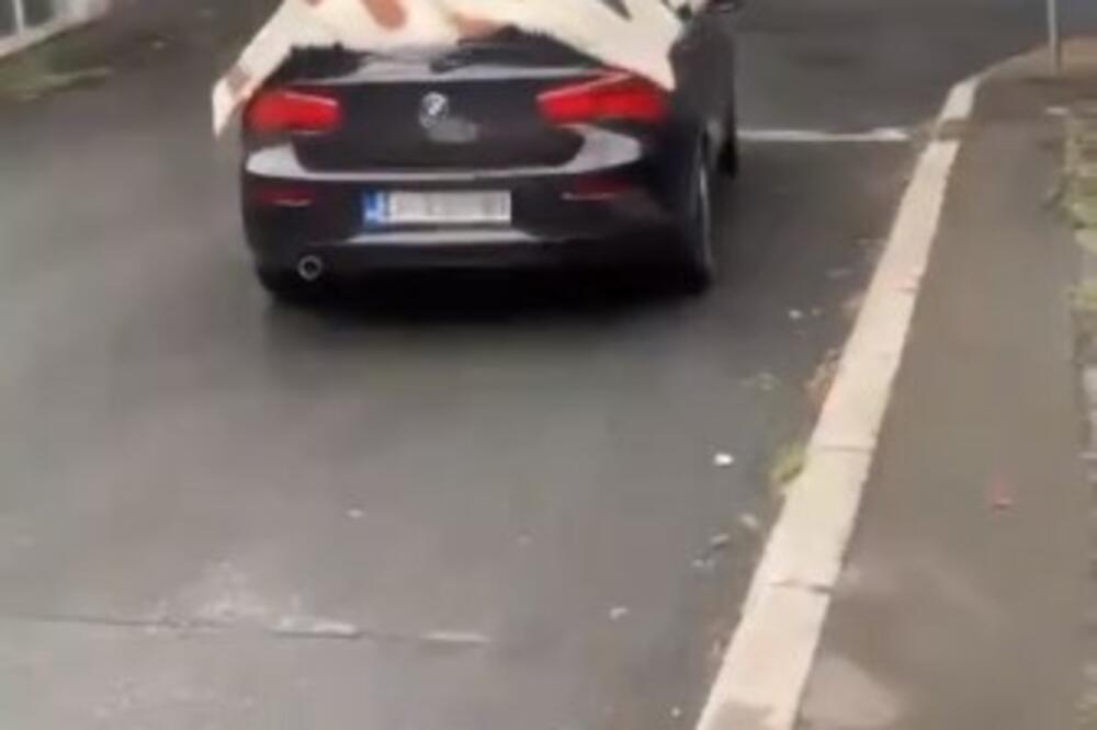 URNEBESAN SNIMAK KRUŽI MREŽAMA: Pazite kako je Beograđanin ZAŠTITIO automobil od GRADA (VIDEO)